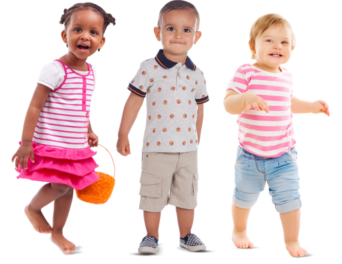 Three toddler-aged children of different races walking and smiling.