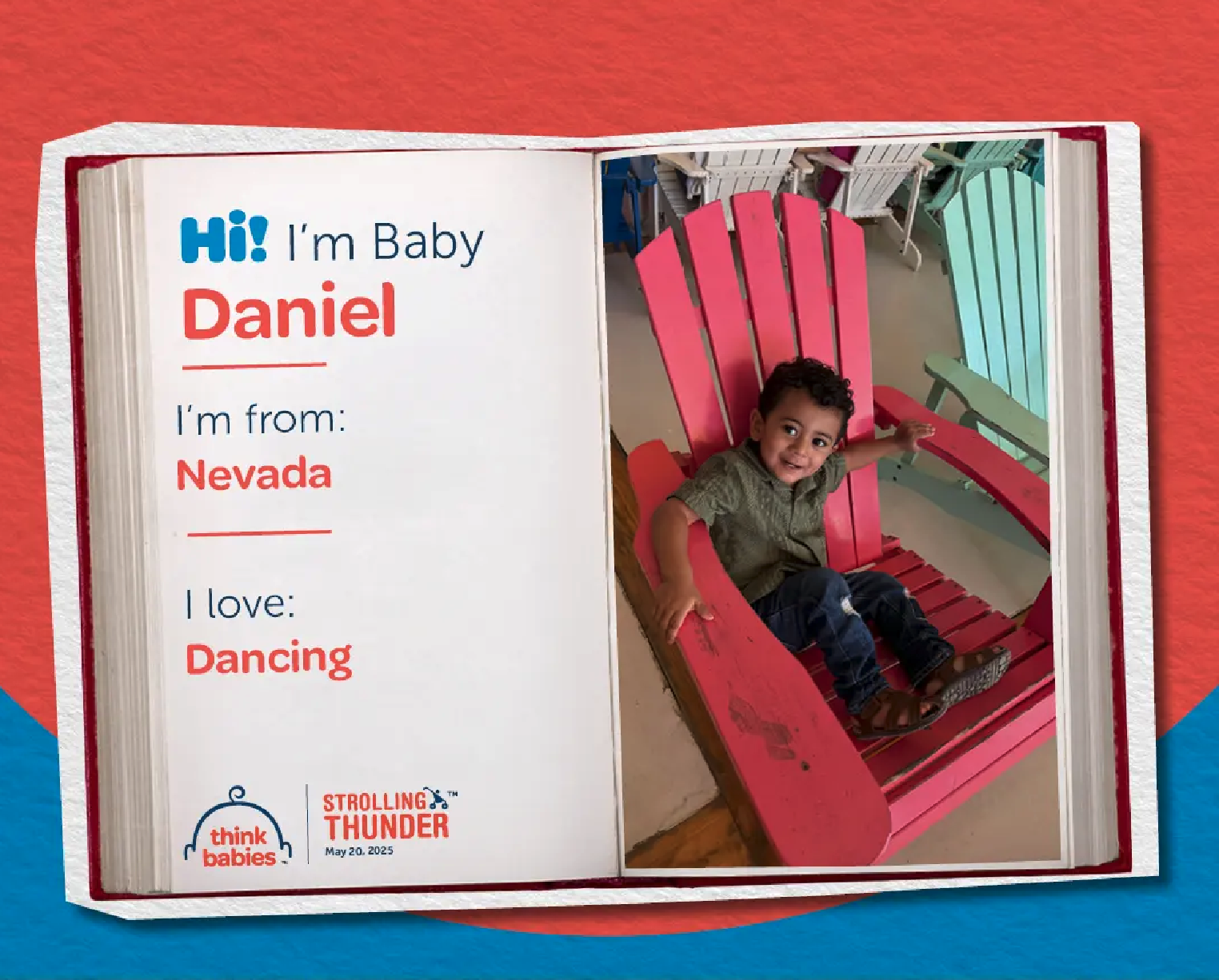 Baby Daniel smiling at camera sitting in big red chair.  