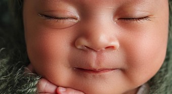 Babys Bounty App Picture- very closeup photo of a baby's face while sleeping.