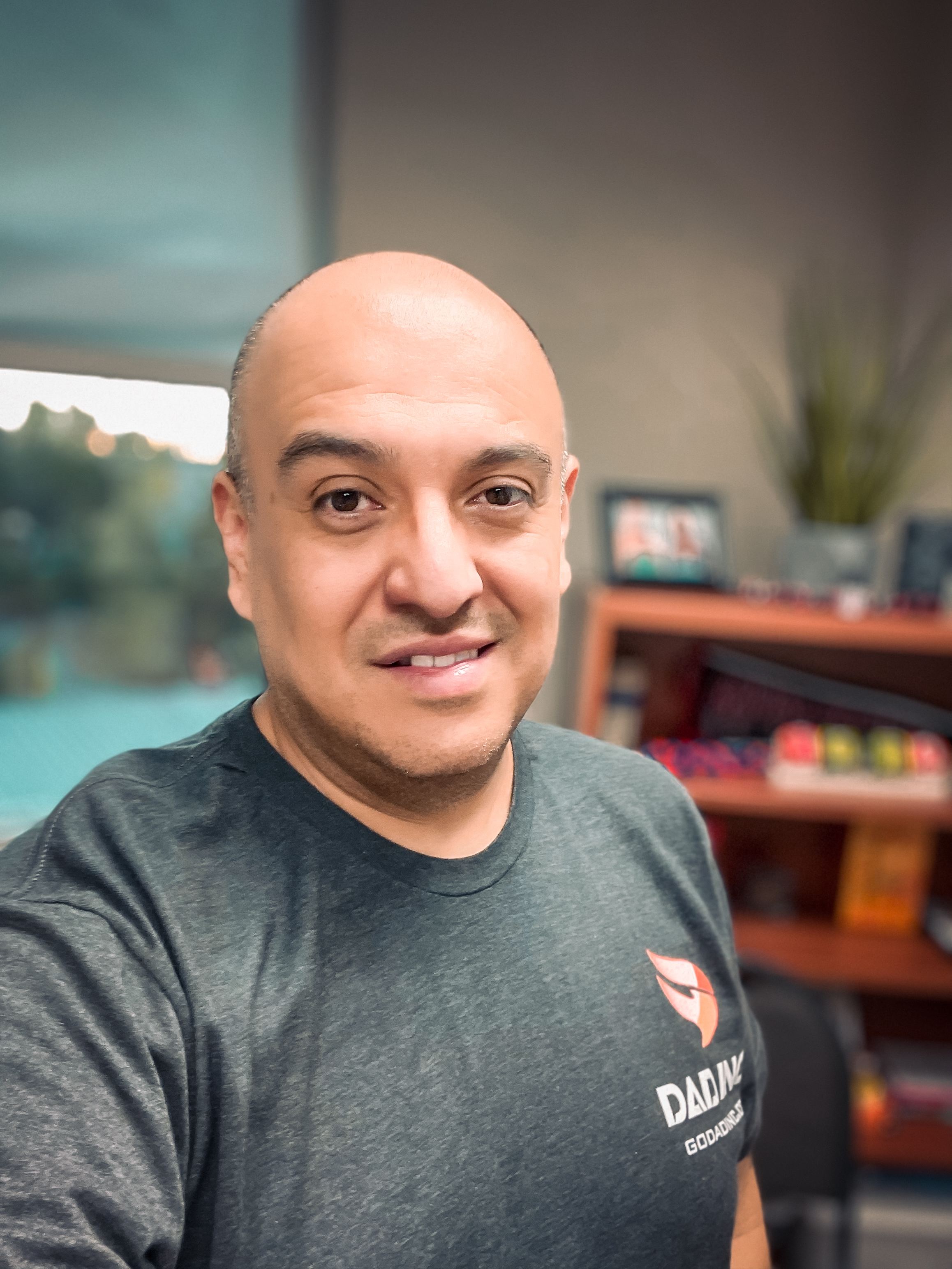 Photo of Jesus Acosta - light skin, bald-headed adult male.