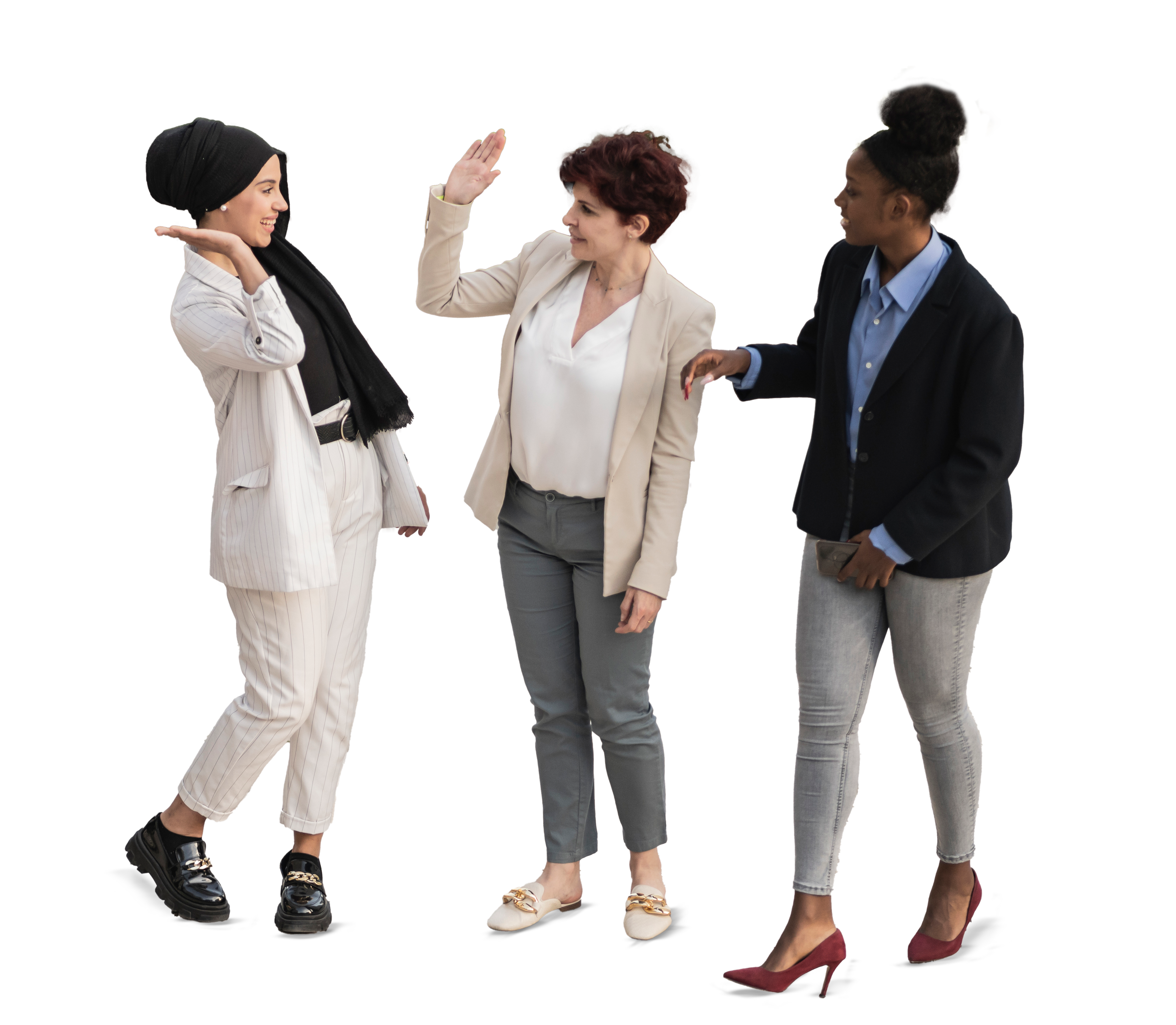 Group of businesswomen of different ethnicities dressed nicely all giving high-fives.